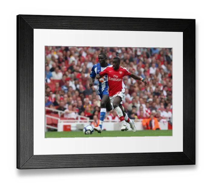 Framed Print : Emmanuel Eboue (Arsenal) Mohamed Diame (Wigan) Framed Print : Emmanuel Eboue (Arsenal) Mohamed Diame (Wigan)
