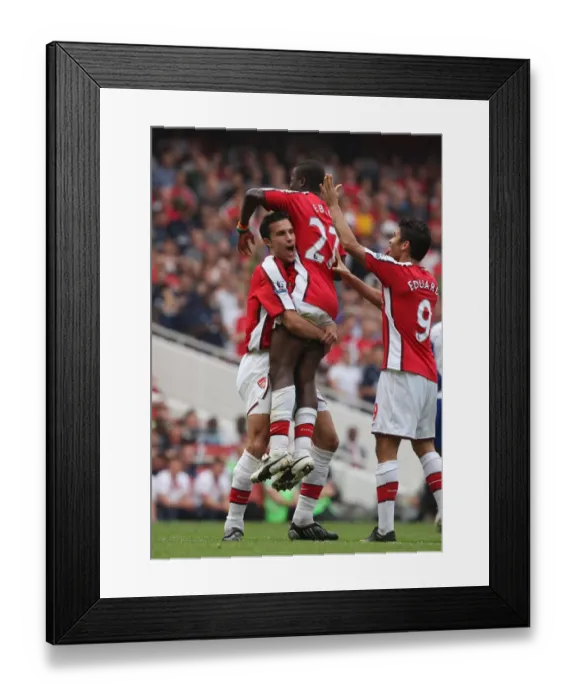 Framed Print : Emmanuel Eboue celebrates scoring Arsenals 3rd goal Framed Print : Emmanuel Eboue celebrates scoring Arsenals 3rd goal