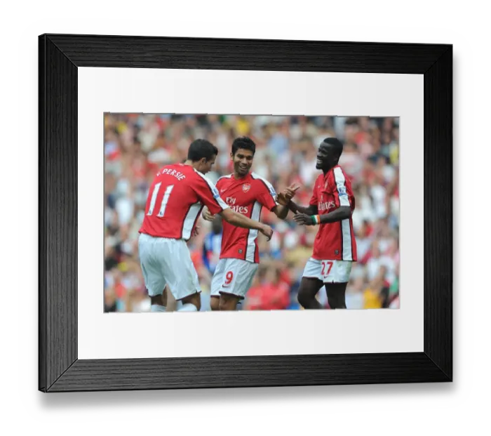 Framed Print : Eboue, Eduardo, and Van Persie: Arsenal's Triumphant Moment - 3rd Goal vs. Wigan Athletic (4:0) Framed Print : Eboue, Eduardo, and Van Persie: Arsenal's Triumphant Moment - 3rd Goal vs. Wigan Athletic (4:0)