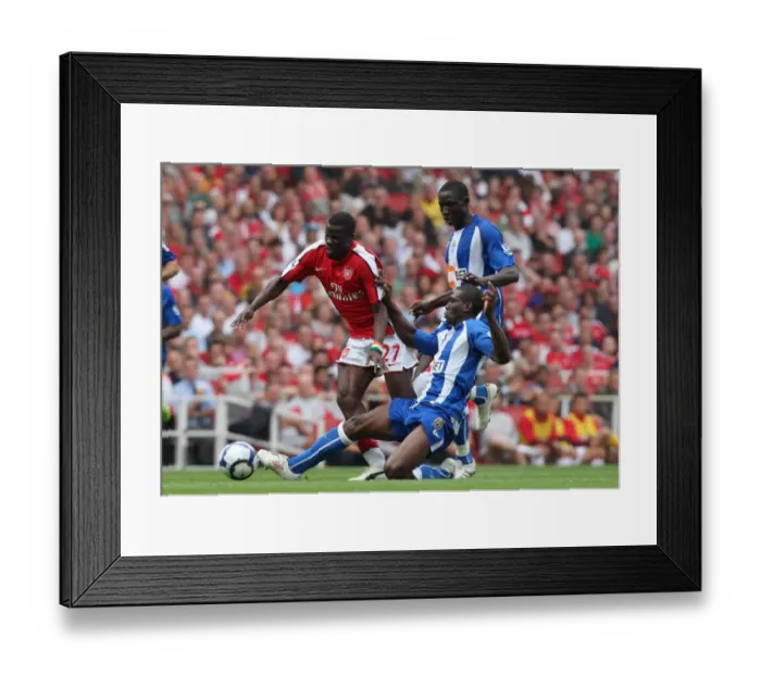 Framed Print : Emmanuel Eboue (Arsenal) Hendry Thomas and Mohamed Diame (Wigan) Framed Print : Emmanuel Eboue (Arsenal) Hendry Thomas and Mohamed Diame (Wigan)