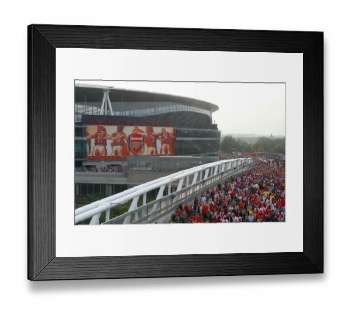 Framed Print : Arsenal fans leave the stadium after the match Framed Print : Arsenal fans leave the stadium after the match