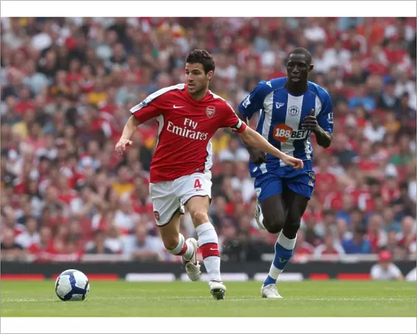 Cesc Fabregas (Arsenal) Mohamed Diame (Wigan)