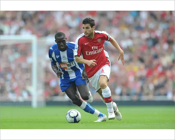 Cesc Fabregas (Arsenal) Mohammed Diame (Wigan)