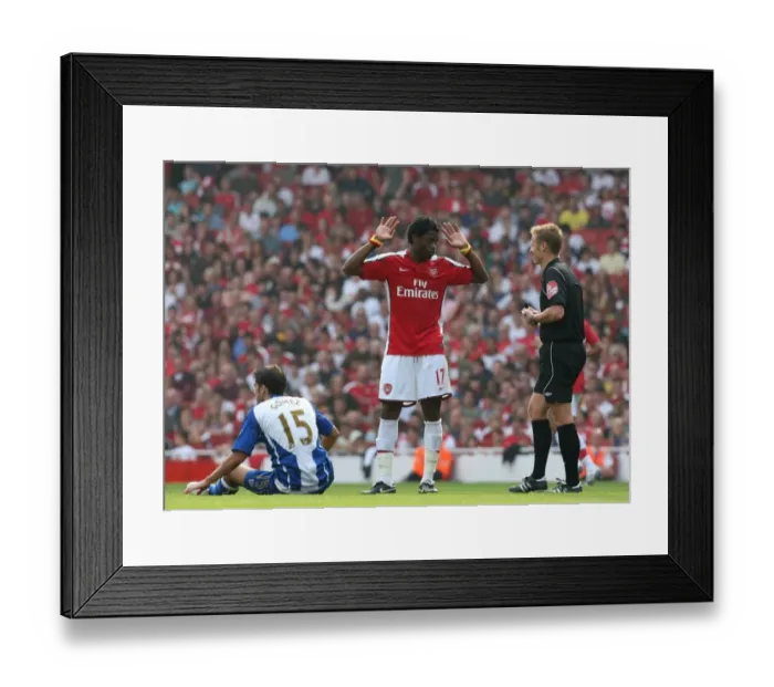 Framed Print : Alex Song (Arsenal) Jordi Gomez (Wigan) and Referee Mike Jones