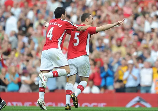Thomas Vermaelen and Cesc Fabregas: Celebrating Arsenal's 4-0 Goal Against Wigan Athletic, 2009