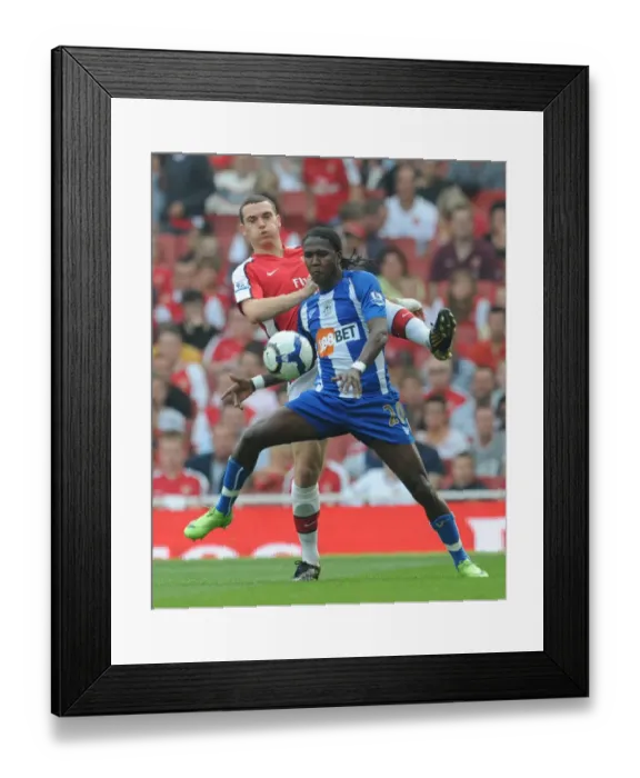 Framed Print : Thomas Vermaelen (Arsenal) Hugo Rodallega (Wigan) Framed Print : Thomas Vermaelen (Arsenal) Hugo Rodallega (Wigan)