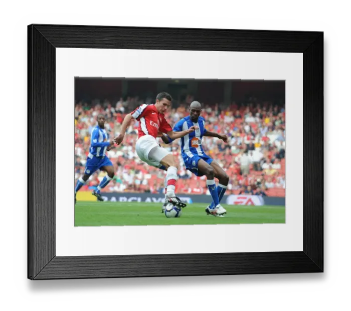 Framed Print : Robin van Persie (Arsenal) Emmerson Boyce (Wigan) Framed Print : Robin van Persie (Arsenal) Emmerson Boyce (Wigan)