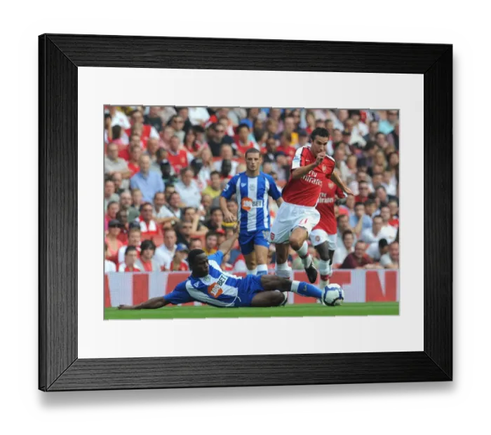 Framed Print : Arsenal's Van Persie Scores Twice in 4-0 Win Over Wigan's Figueroa