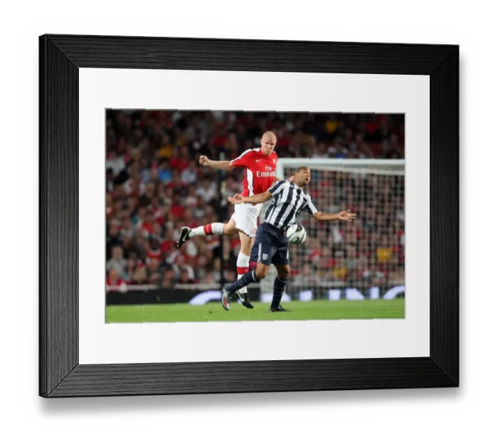 Framed Print : Arsenal's Senderos Scores Twice in 2:0 Carling Cup Victory over West Brom's Moore Framed Print : Arsenal's Senderos Scores Twice in 2:0 Carling Cup Victory over West Brom's Moore