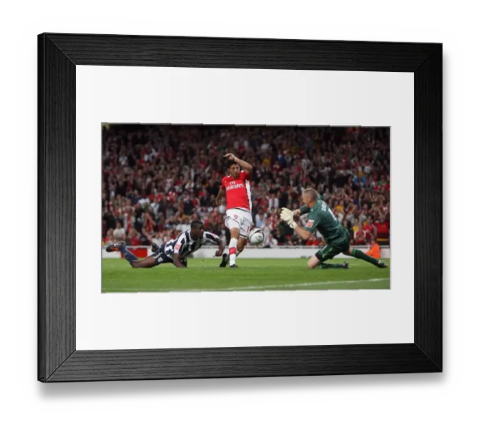 Framed Print : Carlos Vela scores Arsenals 2nd goal past Dean Kiely