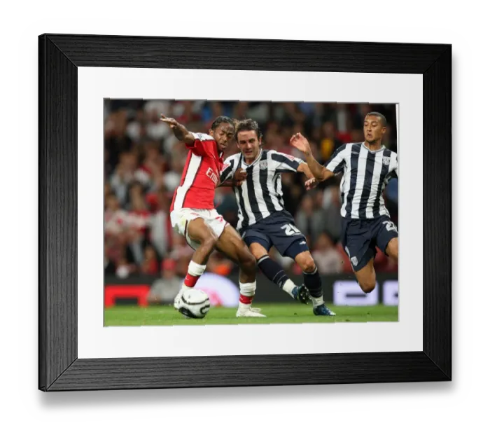 Framed Print : Arsenal's Sanchez Watt, Flippa Teixeira, and Gianni Zuiverloon Celebrate 2:0 Win Over West Bromich Albion in Carling Cup