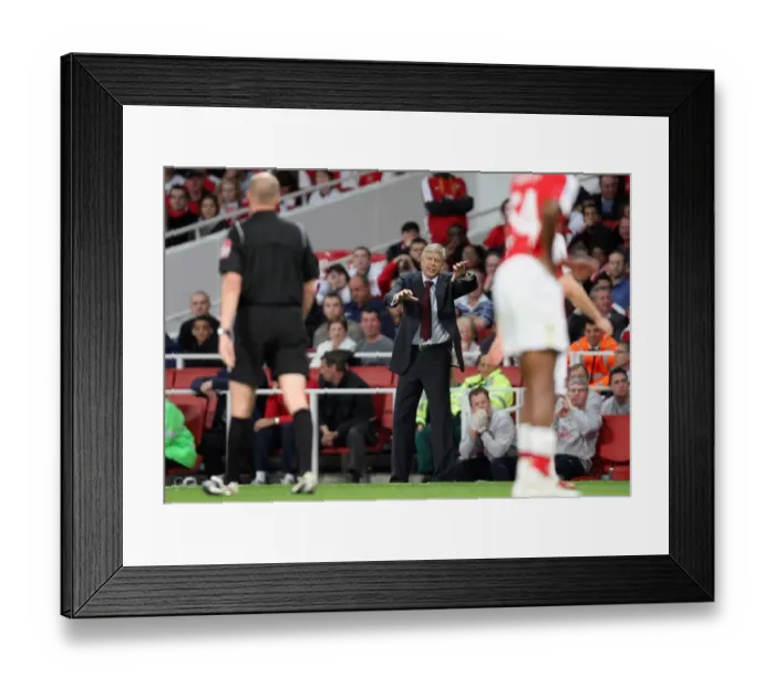 Framed Print : Arsene Wenger the Arsenal Manager appeals for a foul