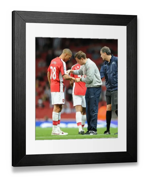 Framed Print : Kieran Gibbs (Arsenal) and Physio Colin Lewin