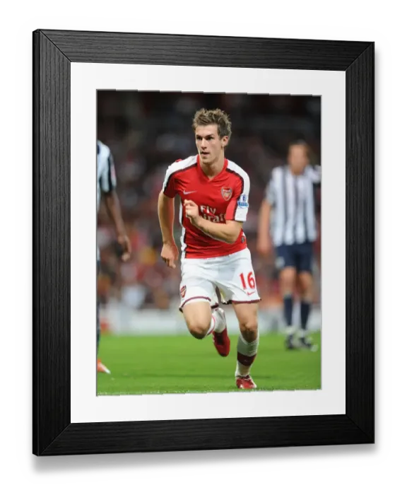 Framed Print : Arsenal's Aaron Ramsey Scores Game-Winning Goal vs. West Brom in Carling Cup Third Round Framed Print : Arsenal's Aaron Ramsey Scores Game-Winning Goal vs. West Brom in Carling Cup Third Round