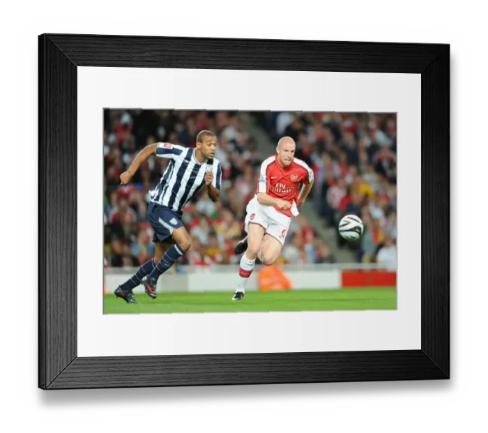 Framed Print : Philippe Senderos (Arsenal) Luke Moore (WBA) Framed Print : Philippe Senderos (Arsenal) Luke Moore (WBA)