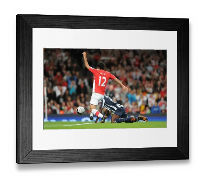 Framed Print : Carlos Vela beats Leon Barnett