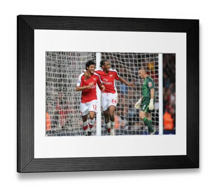 Framed Print : Carlos Vela and Sanchez Watt: Celebrating Arsenal's 2-0 Goals Against West Brom in Carling Cup Framed Print : Carlos Vela and Sanchez Watt: Celebrating Arsenal's 2-0 Goals Against West Brom in Carling Cup