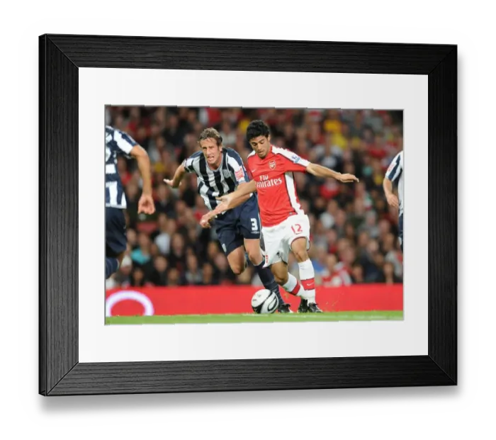 Framed Print : Carlos Vela (Arsenal) Jonas Olsson (WBA) Framed Print : Carlos Vela (Arsenal) Jonas Olsson (WBA)