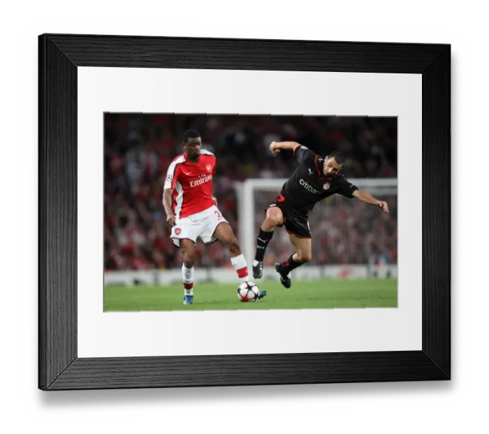 Framed Print : Abou Diaby (Arsenal) Ieroklis Stoltidis (Olympiacos)