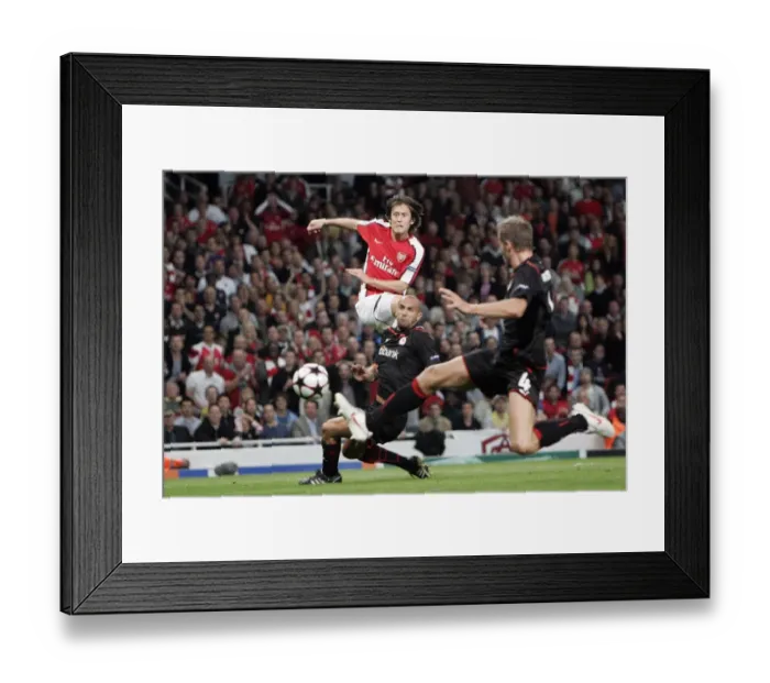 Framed Print : Tomas Rosicky (Arsenal) Raul Bravo (Olympiacos) Framed Print : Tomas Rosicky (Arsenal) Raul Bravo (Olympiacos)