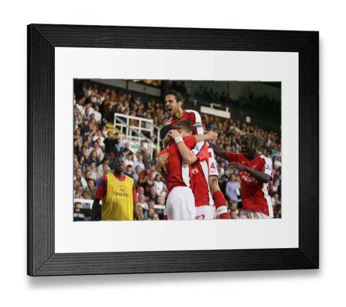 Framed Print : Cesc Fabregas Euphoric Celebration: Robin van Persie's Game-Winning Goal for Arsenal at Fulham, Barclays Premier League, 2009