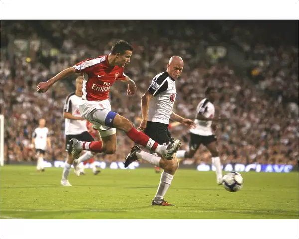 Robin van Persie (Arsenal) Paul Konchesky (Fulham)