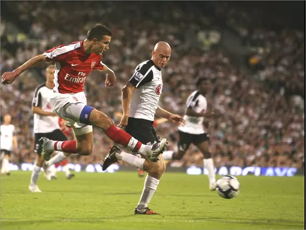 Robin van Persie (Arsenal) Paul Konchesky (Fulham)