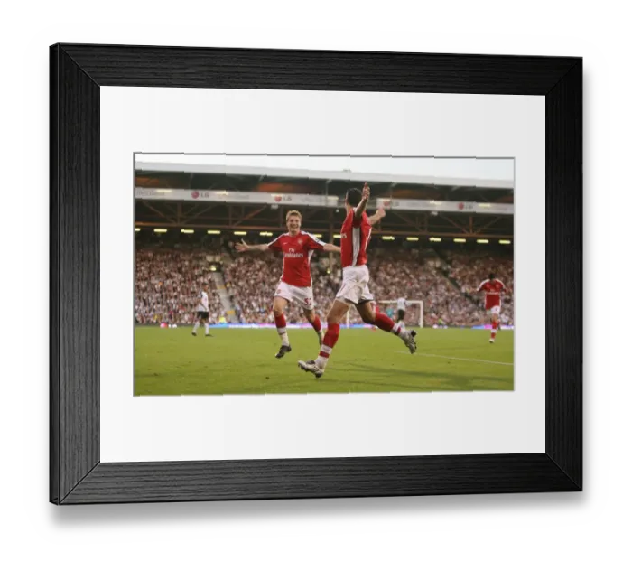 Framed Print : Robin van Persie's Thrilling Goal Celebration with Nicklas Bendtner: Arsenal's 1-0 Victory over Fulham in the Premier League Framed Print : Robin van Persie's Thrilling Goal Celebration with Nicklas Bendtner: Arsenal's 1-0 Victory over Fulham in the Premier League