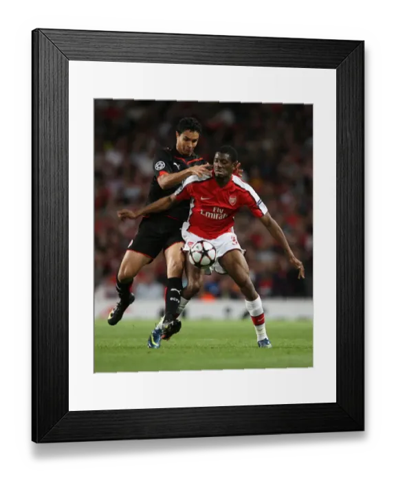 Framed Print : Abou Diaby (Arsenal) Dudu (Olympiacos) Framed Print : Abou Diaby (Arsenal) Dudu (Olympiacos)