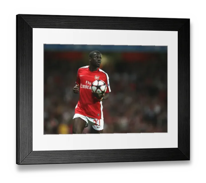 Framed Print : Arsenal's Emmanuel Eboue Scores the Winning Goal Against Olympiacos in the UEFA Champions League