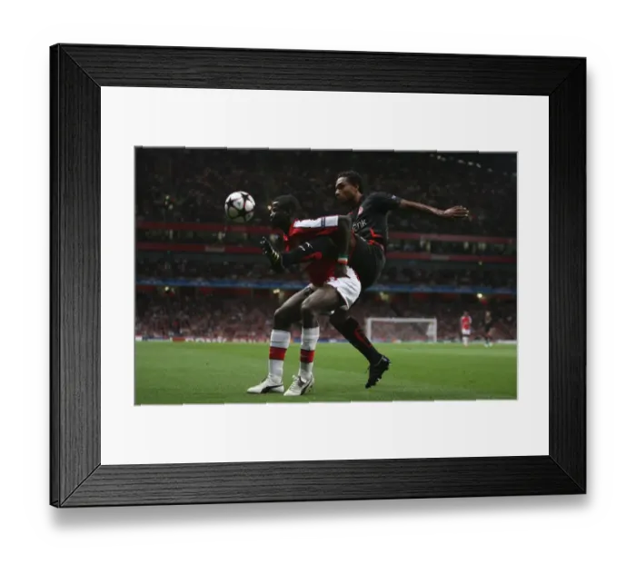 Framed Print : Emmanuel Eboue (Arsenal) Leonardo (Olympiacos) Framed Print : Emmanuel Eboue (Arsenal) Leonardo (Olympiacos)