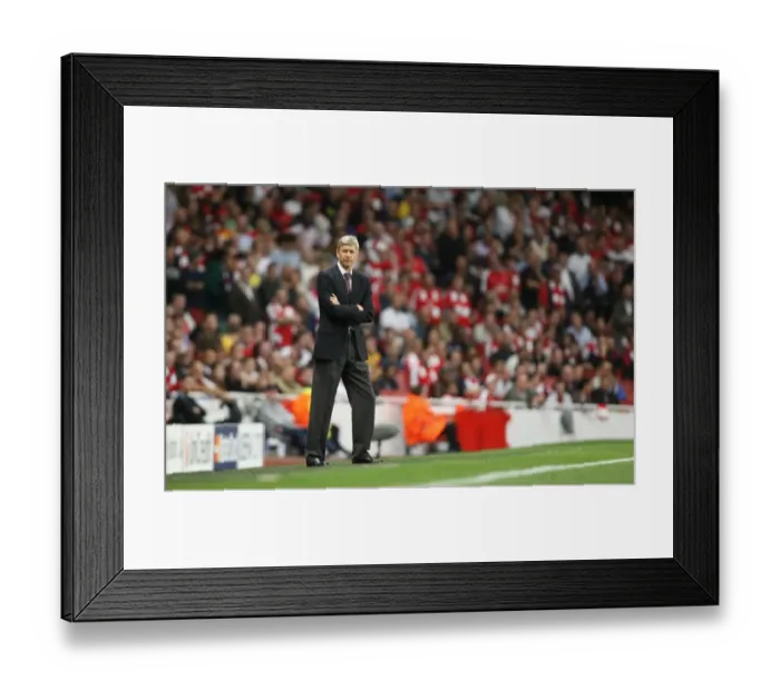Framed Print : Arsene Wenger's Triumph: Arsenal's 2-0 Champions League Victory over Olympiacos (2009) Framed Print : Arsene Wenger's Triumph: Arsenal's 2-0 Champions League Victory over Olympiacos (2009)