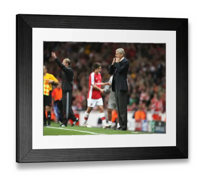 Framed Print : Arsene Wenger's Triumph: Arsenal's 2-0 UEFA Champions League Victory over Olympiacos (2009)