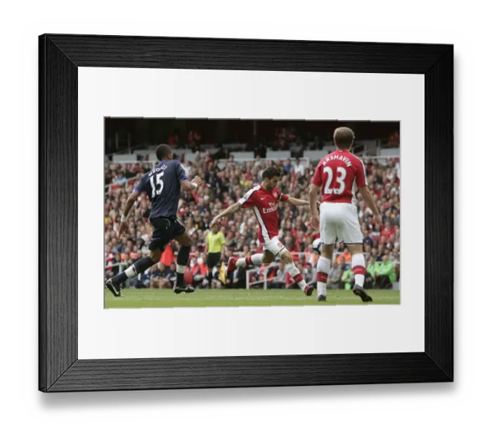 Framed Print : Cesc Fabregas scores Arsenals 4th goal as Steven Nzoni