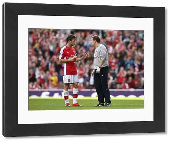 Cesc Fabregas with Arsenal physio Colin Lewin