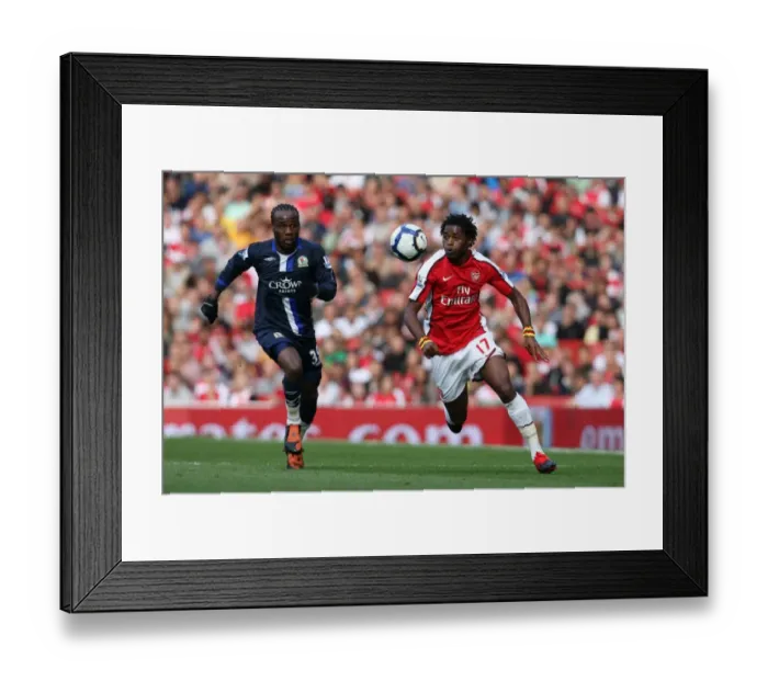 Framed Print : Arsenal's Double Victory: Alex Song Shines in 6-2 Rout of Blackburn Rovers Framed Print : Arsenal's Double Victory: Alex Song Shines in 6-2 Rout of Blackburn Rovers