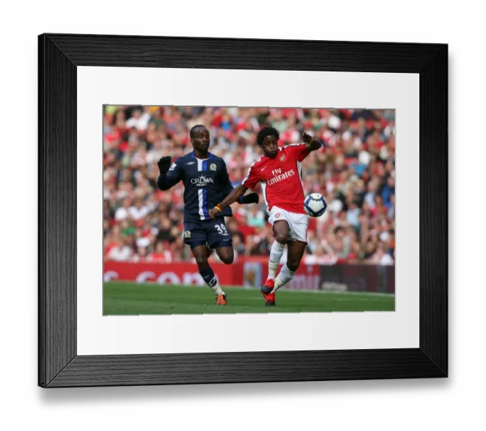 Framed Print : Arsenal's Double Victory: Alex Song's Brilliant Performance in Arsenal's 6-2 Win over Blackburn Rovers Framed Print : Arsenal's Double Victory: Alex Song's Brilliant Performance in Arsenal's 6-2 Win over Blackburn Rovers