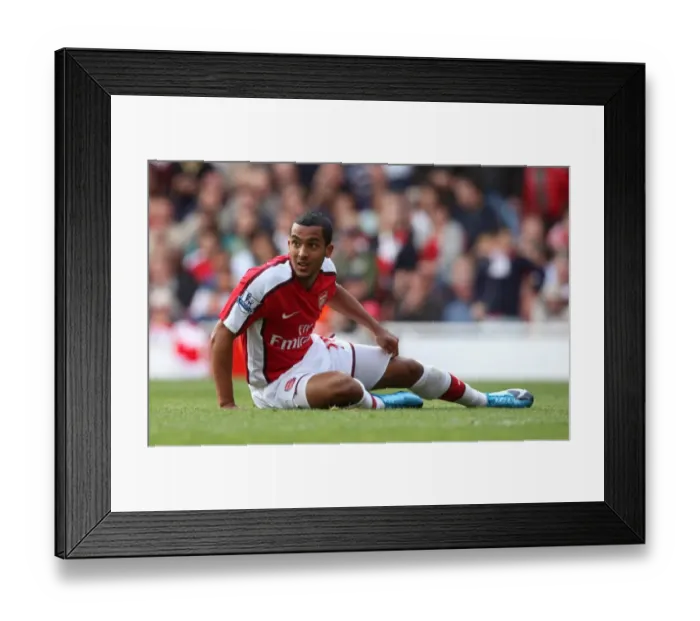 Framed Print : Theo Walcott's Unforgettable Performance: Arsenal's Thrilling 6-2 Victory Over Blackburn Rovers in the Premier League Framed Print : Theo Walcott's Unforgettable Performance: Arsenal's Thrilling 6-2 Victory Over Blackburn Rovers in the Premier League