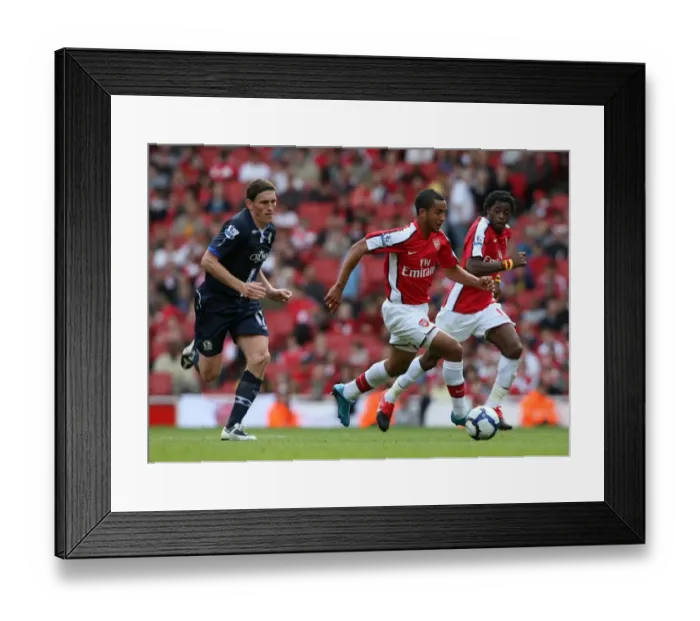 Framed Print : Theo Walcott (Arsenal) Keith Andrews (Blackburn) Framed Print : Theo Walcott (Arsenal) Keith Andrews (Blackburn)
