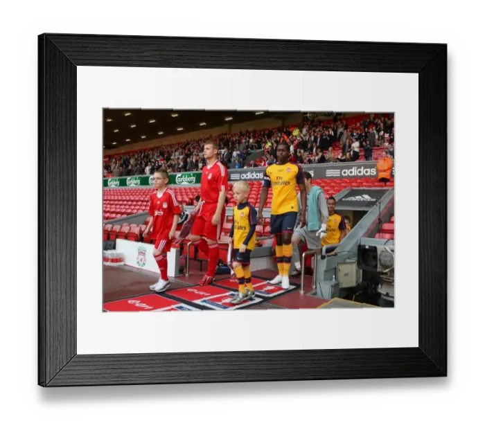 Framed Print : Jay Thomas (Arsenal) leads out the team with the Arsenal Mascot