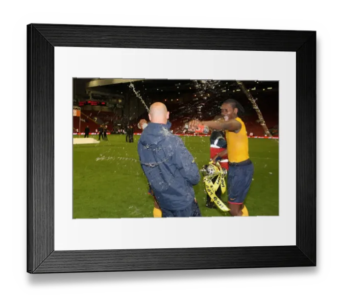 Framed Print : Captain Jay Thomas soaks Youth Team Coach Steve Bould after the match Framed Print : Captain Jay Thomas soaks Youth Team Coach Steve Bould after the match