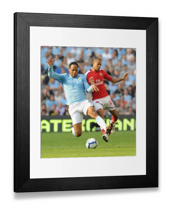 Framed Print : Clash of Titans: Gael Clichy vs Joleon Lescott - Manchester City's Thrilling 4:2 Victory over Arsenal (2009) Framed Print : Clash of Titans: Gael Clichy vs Joleon Lescott - Manchester City's Thrilling 4:2 Victory over Arsenal (2009)
