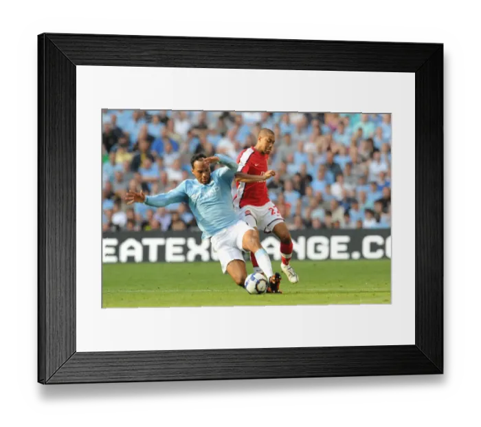 Framed Print : Clash of Titans: Gael Clichy vs Joleon Lescott - Manchester City's Thrilling 4-2 Victory over Arsenal (2009)