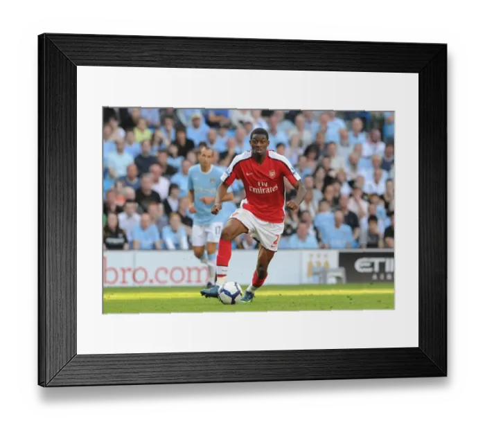 Framed Print : Abou Diaby of Arsenal Faces Manchester City in Barclays Premier League Clash at Eastlands, 2009