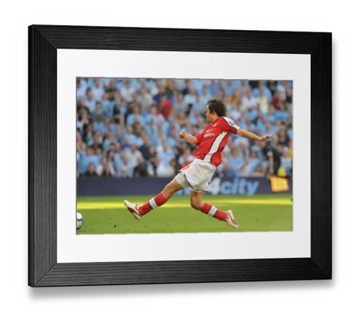 Framed Print : Tomas Rosicky shoots past Man City goalkeeper Shay