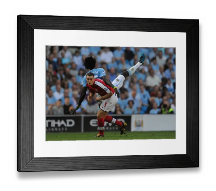 Framed Print : Manchester Derby Clash: Vermaelen vs. Adebayor - Manchester City's 4-2 Victory over Arsenal, 2009 Framed Print : Manchester Derby Clash: Vermaelen vs. Adebayor - Manchester City's 4-2 Victory over Arsenal, 2009