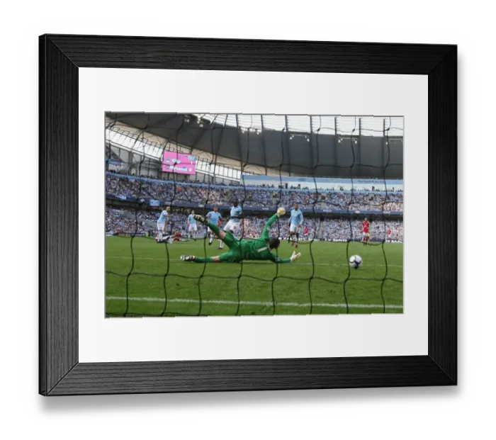 Framed Print : Robin van Persie shoots past Man City goalkeeper Shay