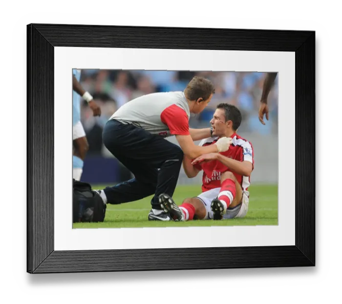 Framed Print : Robin van Persie's Injury: Adebayor's Kick Marrs Arsenal's Victory, Manchester City vs. Arsenal, 2009 Framed Print : Robin van Persie's Injury: Adebayor's Kick Marrs Arsenal's Victory, Manchester City vs. Arsenal, 2009