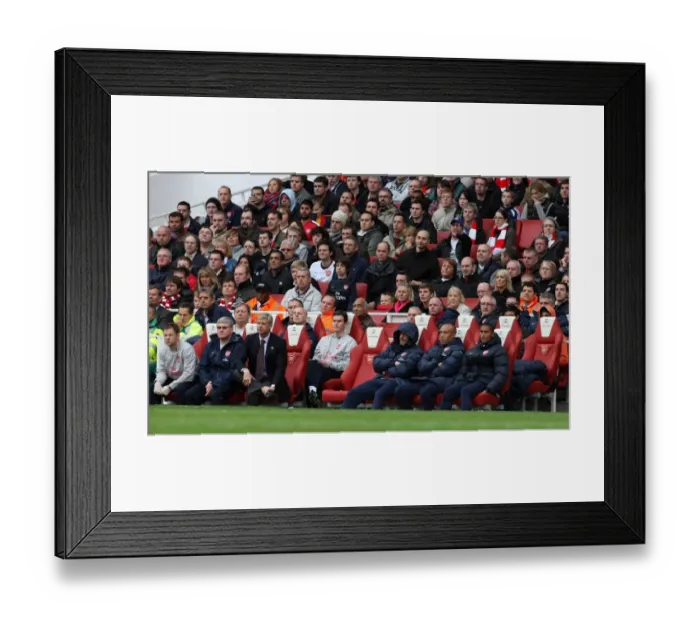 Framed Print : Arsene Wenger the Arsenal Manager and the Arsenal subs Framed Print : Arsene Wenger the Arsenal Manager and the Arsenal subs