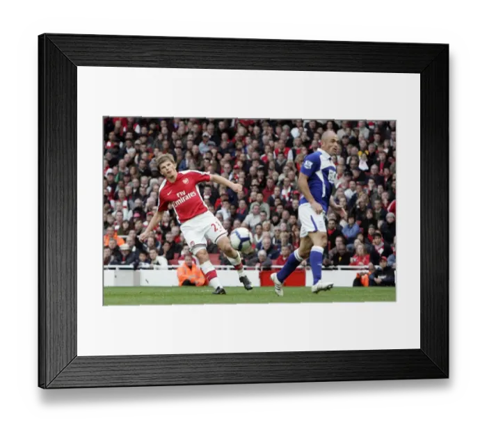 Framed Print : Andrey Arshavin scores Arsenals 3rd goal as Stephen Carr